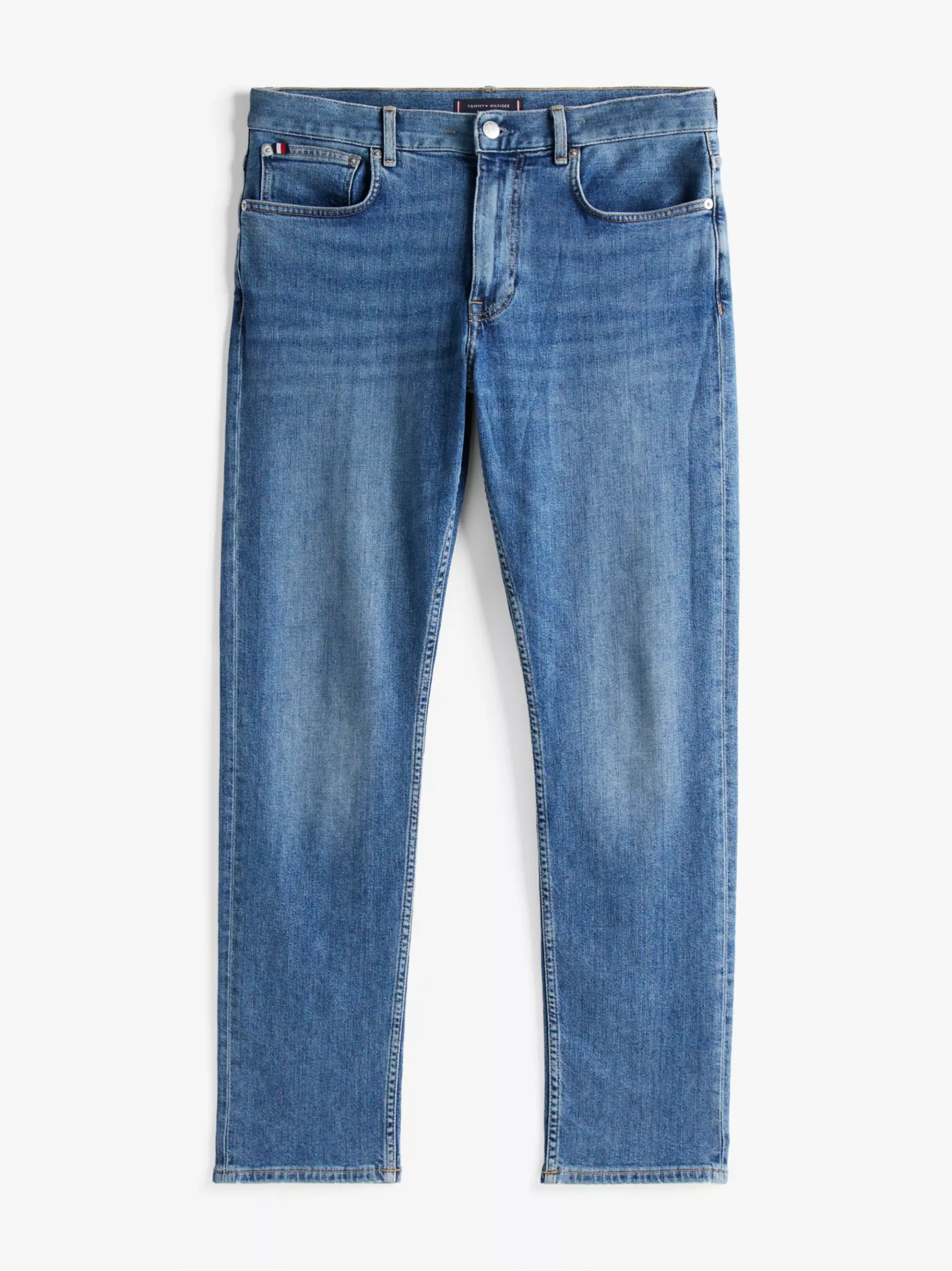 Tommy Hilfiger Harlem Tapered Leg Jeans mit Fade-Effekt STONE BLUE Store